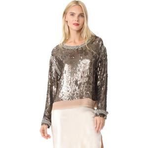 Shimmery sequins cover this slouchy Loyd/Ford pullover.